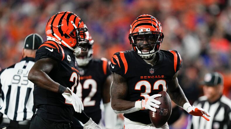 Cincinnati Bengals safety Nick Scott holds the ball after collecting a fumble by Buffalo Bills tight end Dalton Kincaid, not visible, during the second half of an NFL football game, Sunday, Nov. 5, 2023, in Cincinnati. (AP Photo/Carolyn Kaster)
