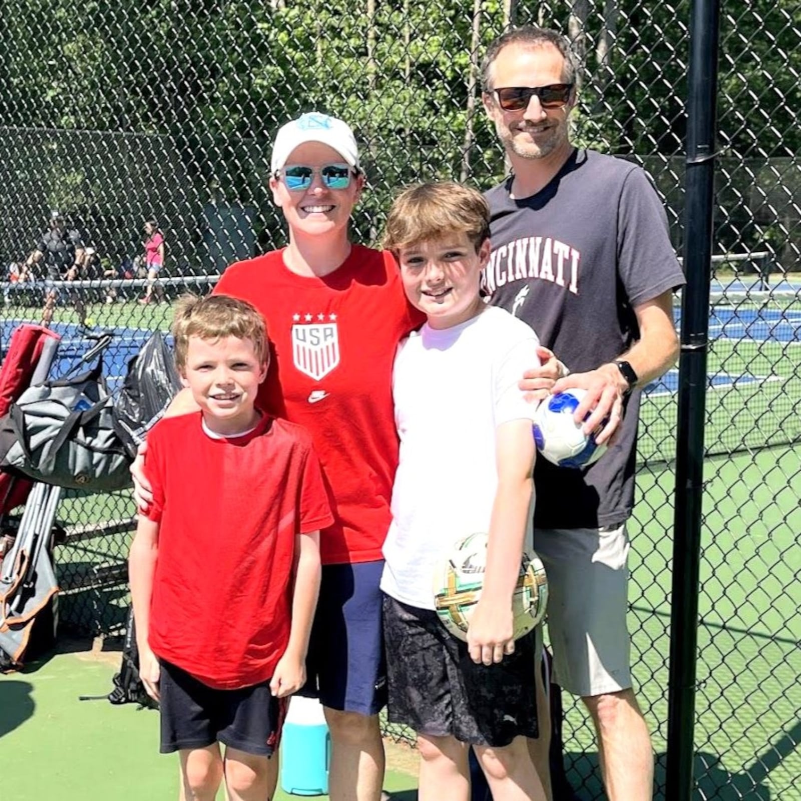 Kristin King Wright and her husband Jeremy Wright with their sons, Kettler (left) and Logan. CONTRIBUTED PHOTO
