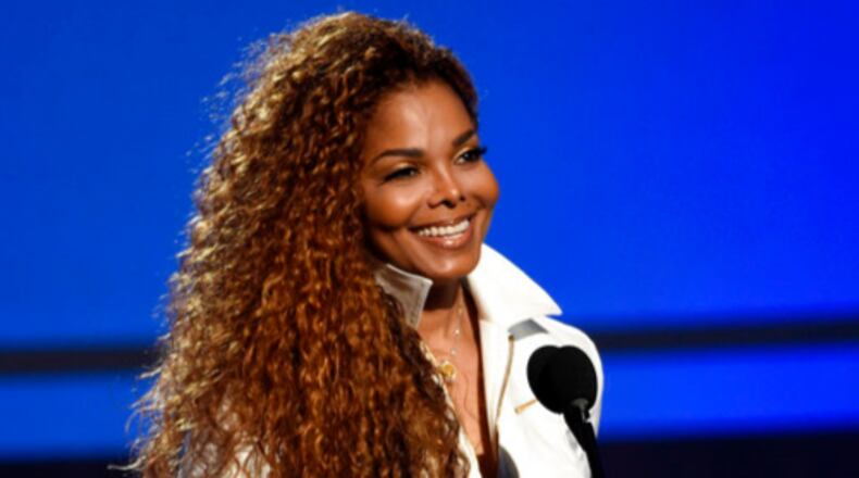 FILE - In this June 28, 2015, file photo, Janet Jackson accepts the ultimate icon: music dance visual award at the BET Awards in Los Angeles. Amid reports of a split, Janet Jackson's husband Wissam Al Mana wrote a heartfelt letter to the superstar on his website. The pair recently became parents to a baby boy, Eissa Al Mana. A rep for Jackson did not confirm that they have split, but a message on his website professes his love for her, calling her the most beautiful person in the world. (Photo by Chris Pizzello/Invision/AP, File)