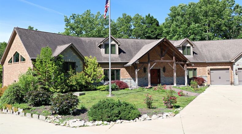 Located along the scenic Stillwater River, this mountain-style home is on the market for $1,400,000. KATHY TYLER / CONTRIBUTED PHOTOS