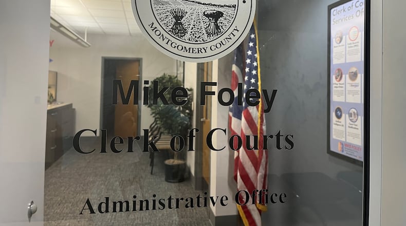 No one answered a buzz at the locked door to the Montgomery County Clerk of Courts office at 3:55 p.m. Wednesday, July 31, 2024, the same day Mike Foley was indicted on multiple felony charges, including theft in office. CORNELIUS FROLIK/STAFF