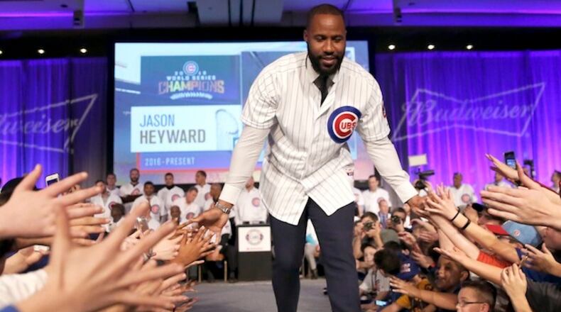 Jayson Hayward is introduced at the Chicago Cubs' annual baseball fan convention Friday, Jan. 13, 2017, in Chicago. (AP Photo/Charles Rex Arbogast)