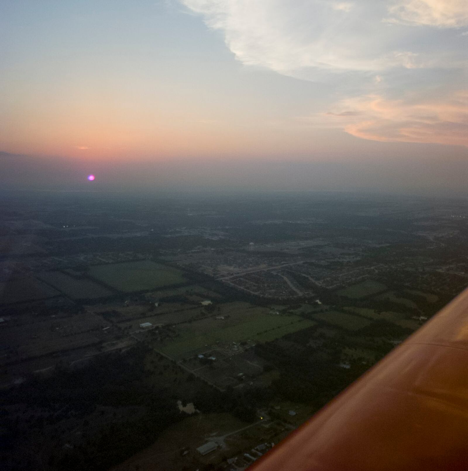 The sun sets in Texas as we approached Grand Prairie Airport in 1997.