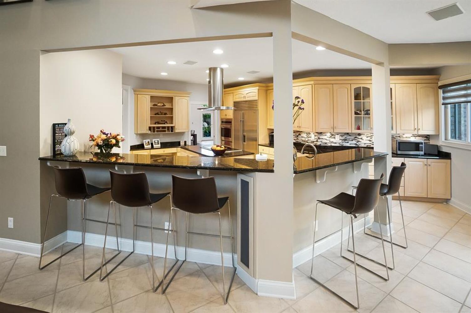 Photos: $1M luxury home listed has waterfall, swimming pool and kitchen to die for