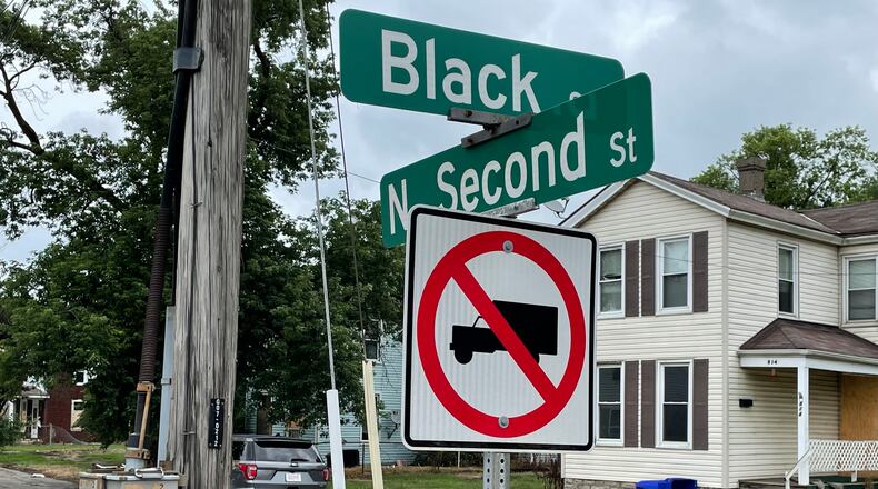 The city has purchased dozens of properties along North Second and North Third streets just off Black Street east of the Spooky Nook development at the former Champion Mill paper company plant. All of the properties recently purchased, and the ones the city purchased in the early 2000s for a different project, will be razed in order to construct a parking lot to support the Spooky Nook development. Pictured is 814 N. Second St., which was purchased by the city earlier this summer. MICHAEL D. PITMAN/FILE