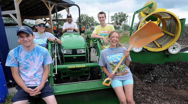 The Foodbank garden team includes front row (left) Bryan Walbridge and Clara Bement; second row (left) Courtney Curtner and Nathan Vanbeysterveldt; and on the tractor is James Hoffer. MARSHALL GORBY/STAFF
