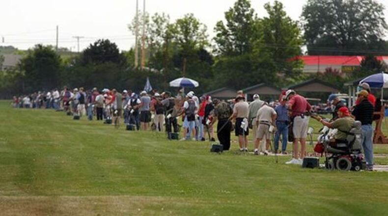 A view looking East of shooters in action on the line in the Ohio Trapshoot Association's annual championship in Morengo, Ohio during Thursday's competition.