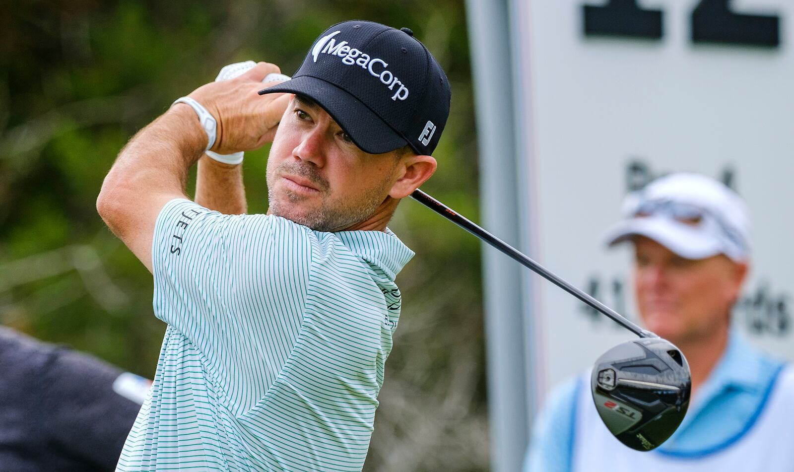 Brian Harman tees off on the 10th hole during the first round of the Texas Open golf tournament, Thursday, April 3, 2025, in San Antonio, Texas. (AP Photos/Rodolfo Gonzalez)