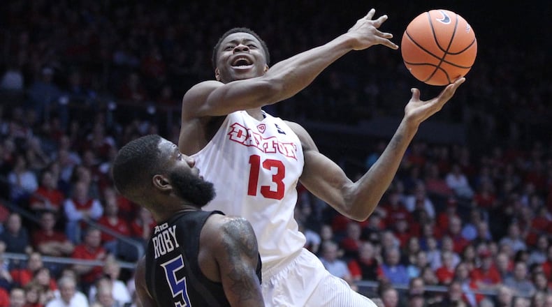 Dayton’s Kostas Antetokounmpo shoots against Saint Louis’ Davell Roby on Tuesday, Feb. 20, 2018, at UD Arena. David Jablonski/Staff