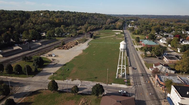 Spikeit LLC of Cincinnati wants to buy about 7 acres in West Carrollton at 200 W. Central Ave., vacant land near the top of this photo. It plans a $4.5 million facility with outdoor and indoor volleyball courts, a restaurant and a bar. The project would include 350 parking spaces. FILE