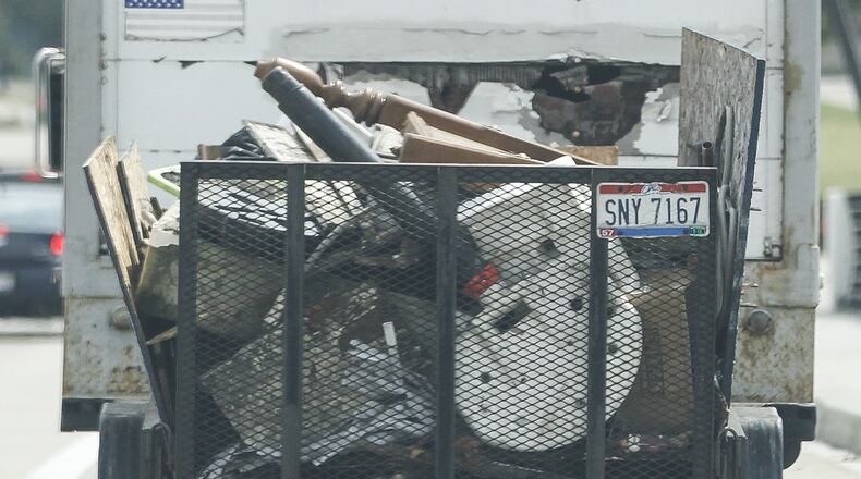 Unsecured loads that spill onto Ohio’s highways result in on average 20 highway fatalities a year and five times as many serious injuries. The cost to clean up also runs into the millions. CHRIS STEWART / STAFF