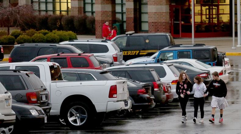 Saying the safety of each and every child in Madison Twp. has to be the “district’s highest priority,” the Madison Local School District Board of Education approved a resolution to allow armed staff in the district. NICK GRAHAM/STAFF