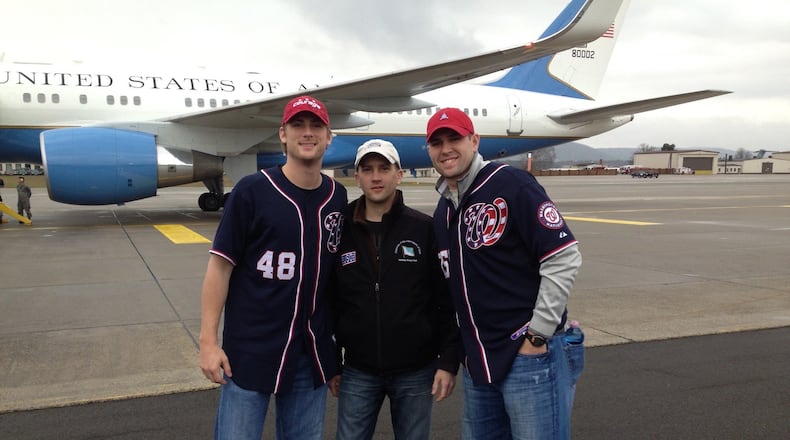 Ross Detweiler, former Washington Nationals pitcher, Shane Hudella, founder of United Heroes League, and Craig Stammen of North Star, Versailles High School and University of Dayton on USO Tour to Middle East that included stops into war zones, onto an aircraft carrier in Persian Gulf and to a military hospital in Germany in 2012. CONTRIBUTED