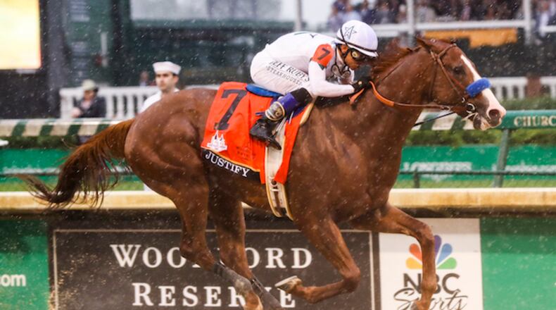Justify, with Mike Smith up, was all alone at the finish in the 144th running of the Kentucky Derby at Churchill Downs in Louisville, Ky., on Saturday, May 5, 2018. (Ron Garrison/Lexington Herald-Leader/TNS)