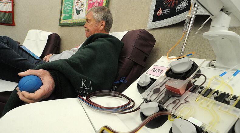 Jeff Fox of Springboro, a platelet donor at the Community Blood Center in Dayton, was making his 538th lifetime donation Monday Feb. 13, 2023. The blood center later rebranded as the Solvita Blood Center and will now be part of Versiti Blood Center of Ohio while Solvita was retain ownership of the tissue services side of the nonprofit. MARSHALL GORBY\STAFF FILE