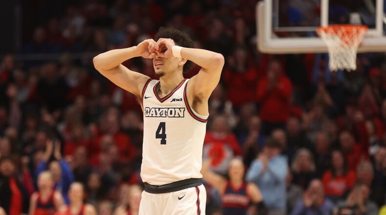 Dayton's Koby Brea reacts after a basket against Rhode Island on Saturday, Jan. 20, 2024, at UD Arena. David Jablonski/Staff