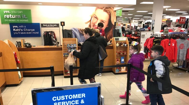 Shoppers return a gift at the Sugarcreek Twp. Kohl’s Wednesday.