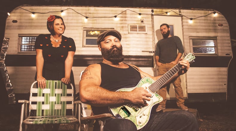Before leaving for a European tour in mid-June, Indiana-based country blues act Reverend Peyton Big Damn Band, (left to right) Breezy, Reverend Peyton and Max Senteney, opens Levitt Pavilion Dayton's 2023 season Thursday, June 1.