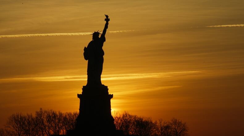 The Statue of Liberty is pictured from Liberty State Park on January 21, 2018 in Jersey City, New Jersey. The iconic landmark was closed yesterday as part of the US government shutdown now entering its second full day after coming into effect at midnight on Friday after senators failed to pass a new federal spending bill. (Photo by Eduardo Munoz Alvarez/Getty Images)