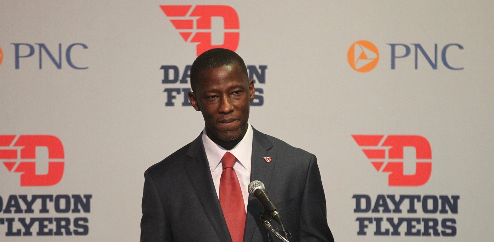 Anthony Grant speaks at a press conference at UD Arena on April 1, 2017, in Dayton. David Jablonski/Staff