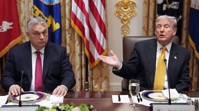 President Donald Trump, right, meets with Hungary's Prime Minister Viktor Orban in the Cabinet Room of the White House, Friday, Nov. 7, 2025, in Washington. (AP Photo/Evan Vucci)