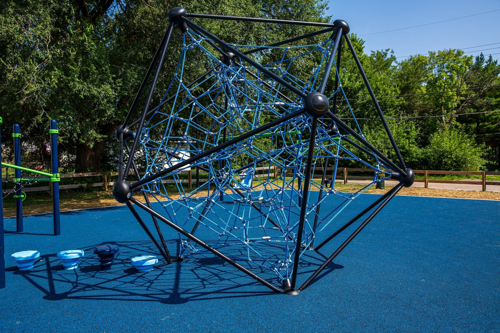 Climbing structures are part of the amenities at the new 4,300-square-foot playground at the Miamisburg’s Sixth & Pearl Playlot. The revamp of the decades old neighborhood playlot is part of citywide upgrades to public play spaces. CONTRIBUTED