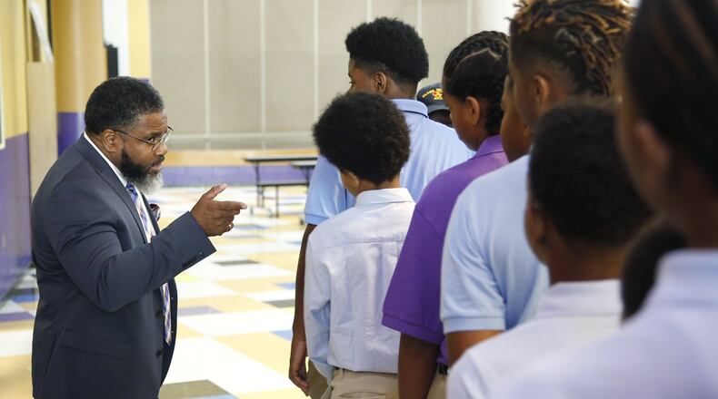On the first day of class in 2018, Dayton Boys Prep Academy Principal Therman Sampson II talks to students about school procedures. TY GREENLEES / STAFF
