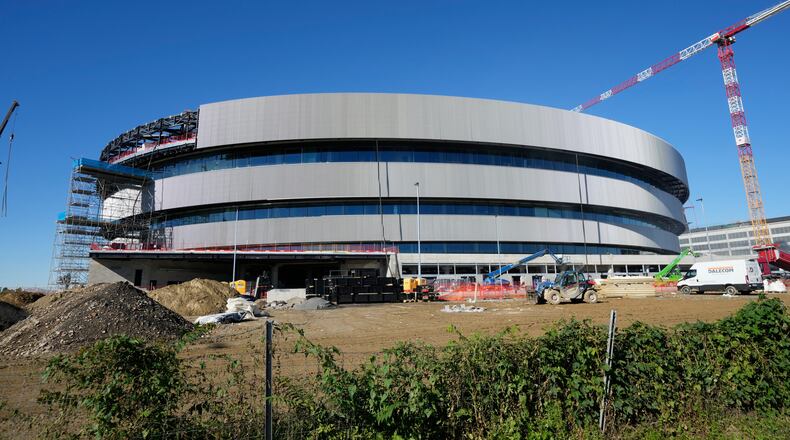 FILE - An outside view of the Santa Giulia Ice Hockey Arena, in Milan, where Ice Hockey discipline of the Milan Cortina 2026 Winter Olympics will take place Italy, Friday, Oct. 24, 2025. (AP Photo/Luca Bruno, File)