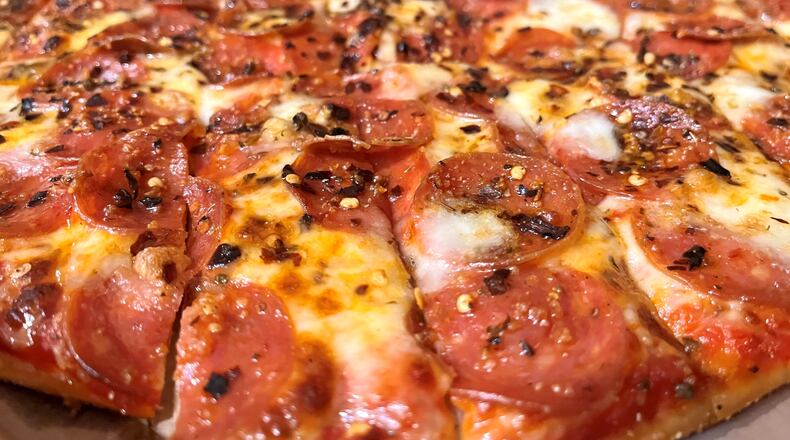 Hot Honey Pepperoni Pizza from Donatos. The pizza features pepperoni, fresh mozzarella, crushed pepper and Mike’s Hot Honey.