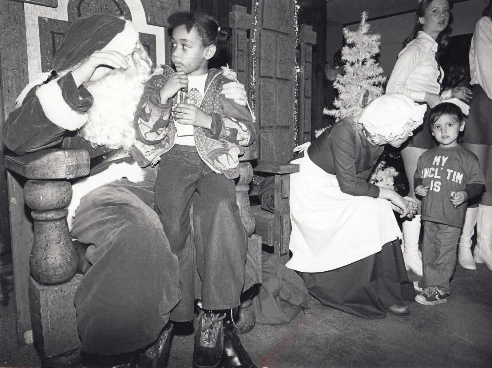A scene from the University of Dayton's Christmas on Campus photographed in 1978. Santa is identified as Richard Story, a sophomore from New Jersey and Mrs. Claus is Mary McNellis a freshman from Chicago. DAYTON DAILY NEWS ARCHIVE