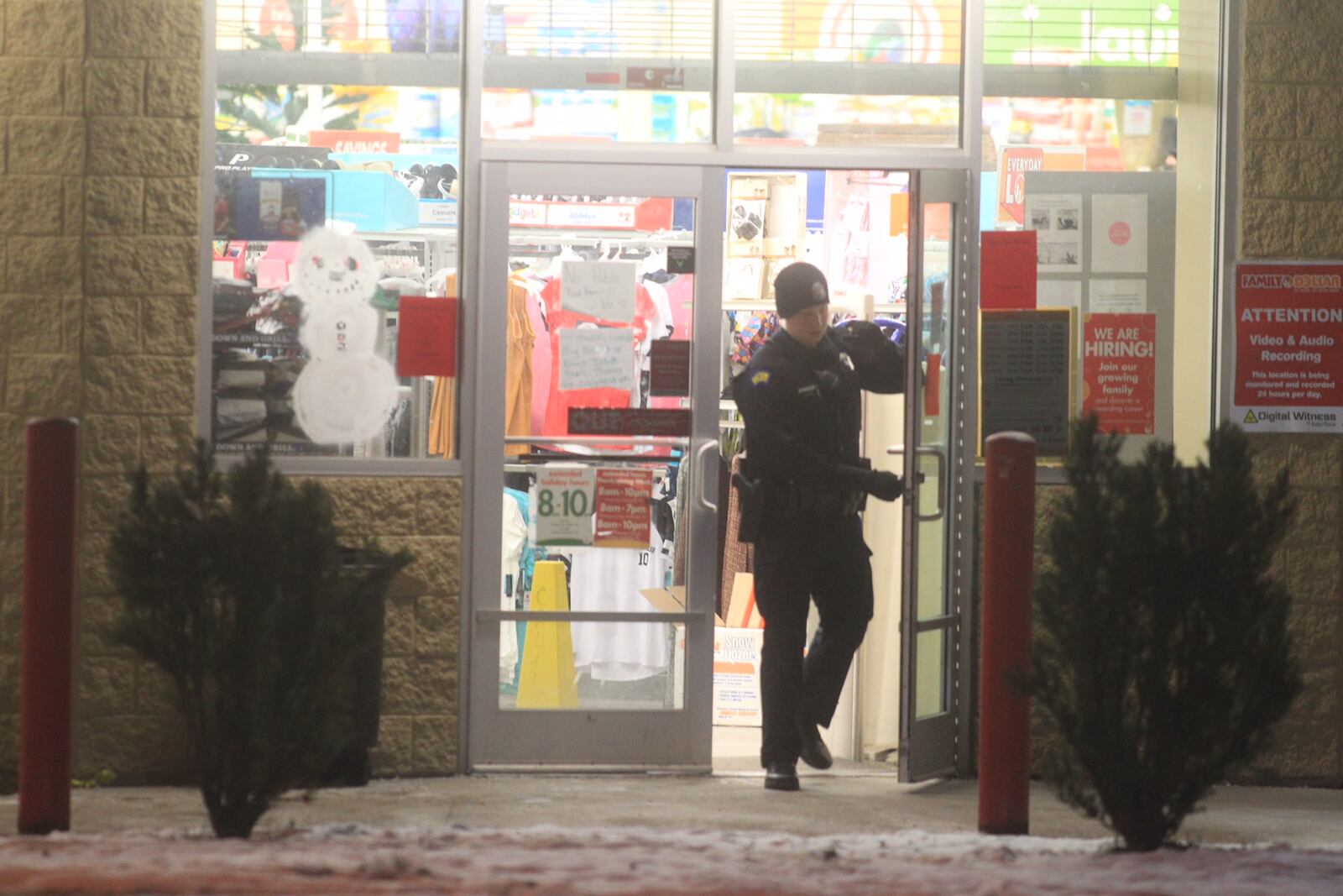 Police investigate an armed robbery Friday night, Dec. 16, 2016, at Family Dollar, 1028 N. Gettysburg Ave., in Dayton. (Jim Noelker/Staff)