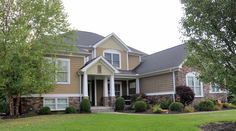 On the market for $649,900, this custom-built home in Troy features many upgrades and creative finishes. Contributed photos by Kathy Tyler