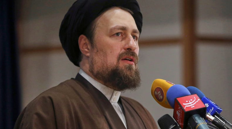FILE - In this Dec. 18, 2015 file photo, Hassan Khomeini, grandson of Ayatollah Khomeini, speaks at the election headquarters of the interior ministry in Tehran, Iran. (AP Photo/Vahid Salemi, File)