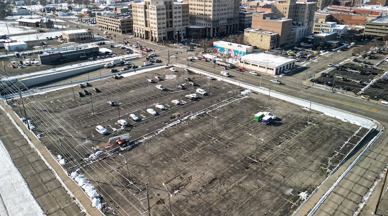 The dual Hilton hotel project, which plans show both a Hampton Inn and Home2Suites at the corner of North MLK Jr. Boulevard and High Street, is expected to begin in 2026, according to the city of Hamilton. Pictured is an aerial of the site on Dec. 4, 2025. NICK GRAHAM/STAFF