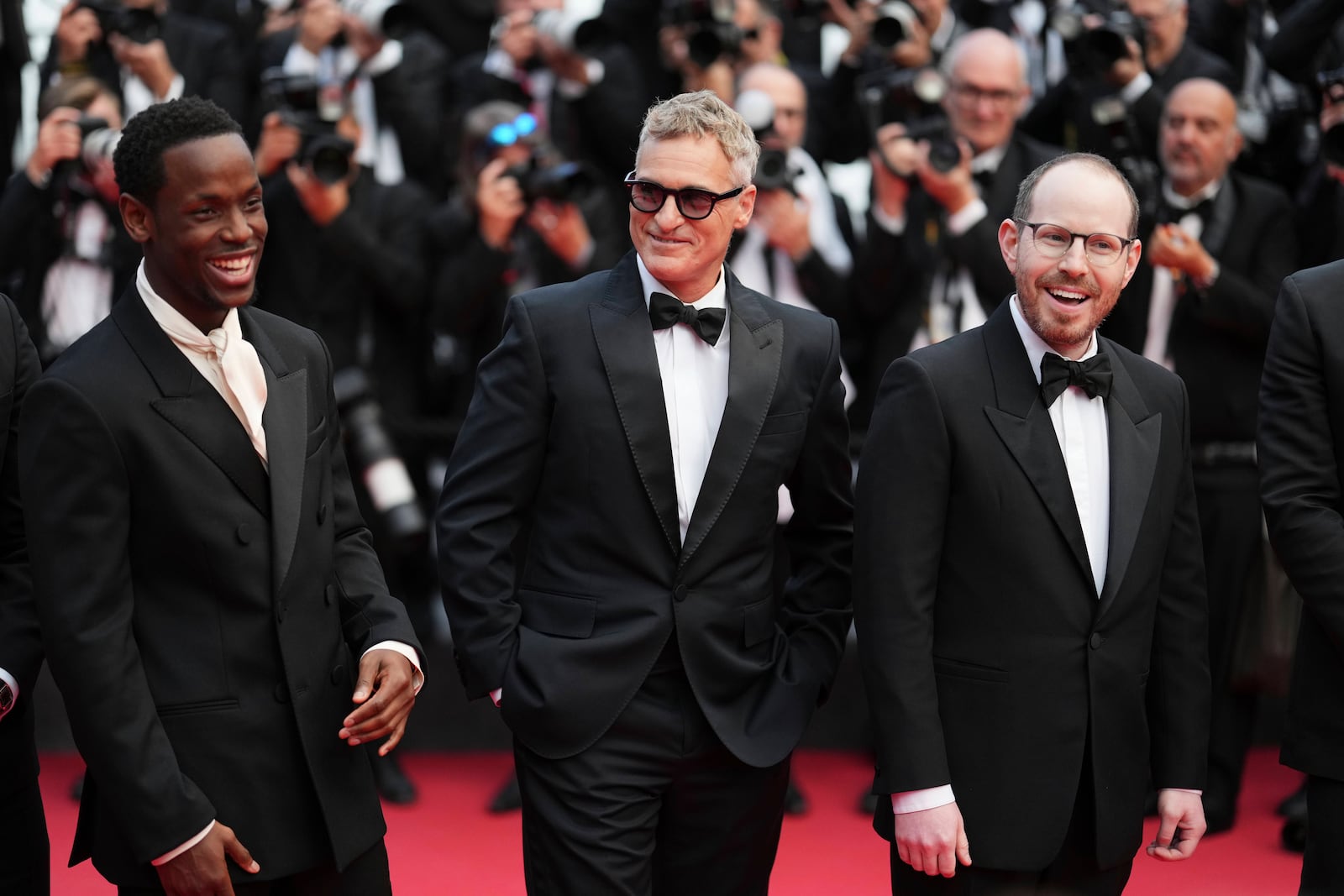 Micheal Ward, from left, Joaquin Phoenix and director Ari Aster pose for photographers upon arrival at the premiere of the film 'Eddington' at the 78th international film festival, Cannes, southern France, Friday, May 16, 2025. (Photo by Lewis Joly/Invision/AP)