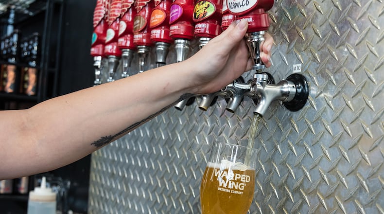 Warped Wing Brewing Company and The Pizza Bandit celebrated the launch of their Acapulco Gold Session IPA collaboration at the brewery’s downtown Dayton taproom on Thursday, April 20, 2023. Attendees also went on a bar crawl that featured stops at The Oregon Express, Blind Bob’s, Dublin Pub, Troll Pub & Yellow Cab Tavern who are also featuring the new beer on tap. Musical entertainment was provided during the crawl by saxophonist Mike Bisig and trumpeter Doug Lane. Did we spot you there? TOM GILLIAM/CONTRIBUTING PHOTOGRAPHER