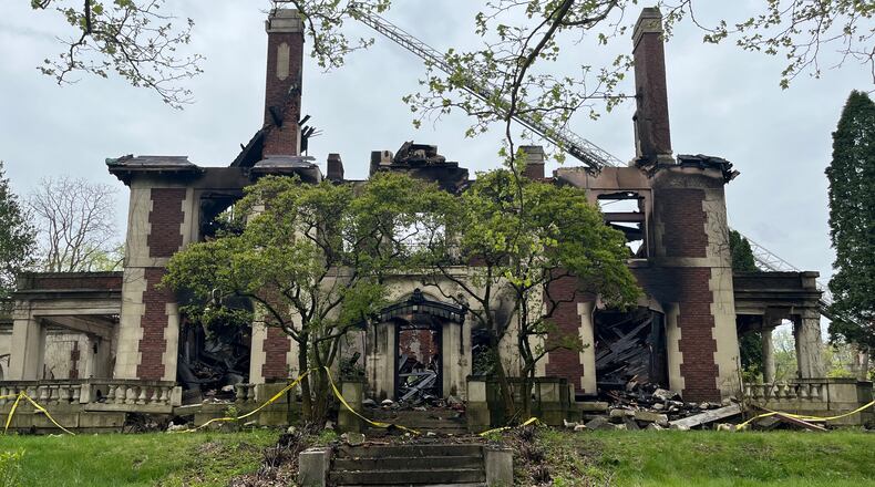 The Traxler Mansion at the corner of Broadway and Yale in West Dayton was badly damaged by fire on Sunday, April 23, 2023. JEREMY P. KELLEY / STAFF