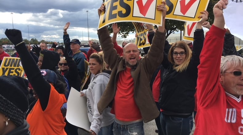 United Auto Workers and supporters rallied outside Fuyao Glass America in Moraine Oct. 25. THOMAS GNAU/STAFF