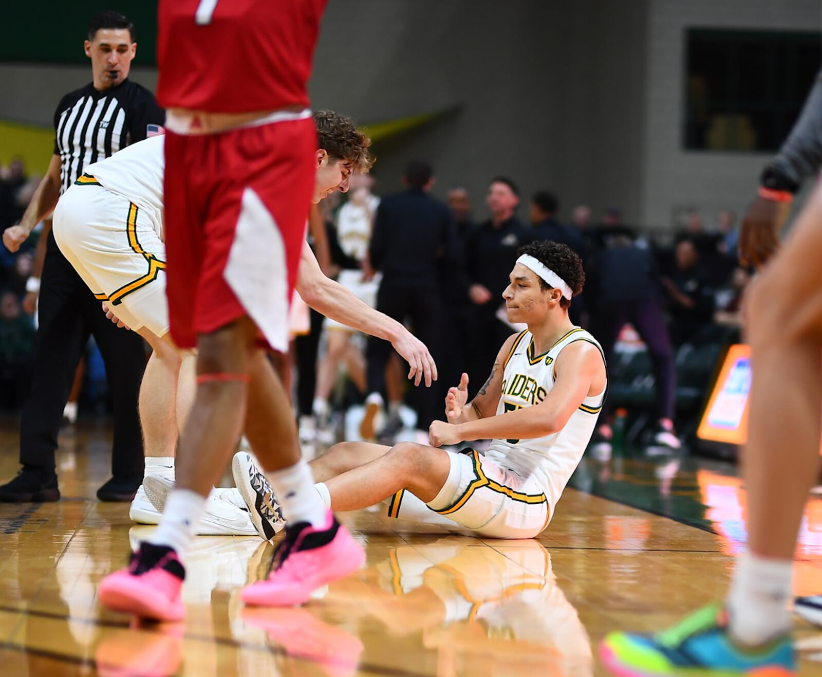 Wright State University's Michael Cooper celebrates with teammate Dominic Pangonis during their game against Miami on Tuesday, Dec. 16, 2025 at the Ervin J. Nutter Center. KYLE HENDRIX / CONTRIBUTED