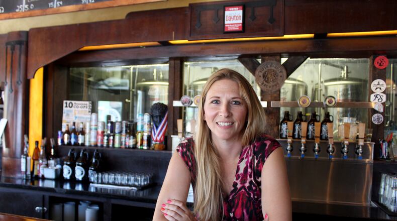 Fifth Street Brewpub has raised $50,000 for local charities since it launched its giveback Monday program in 2013.  Tanya Brock is the pub's general manager.