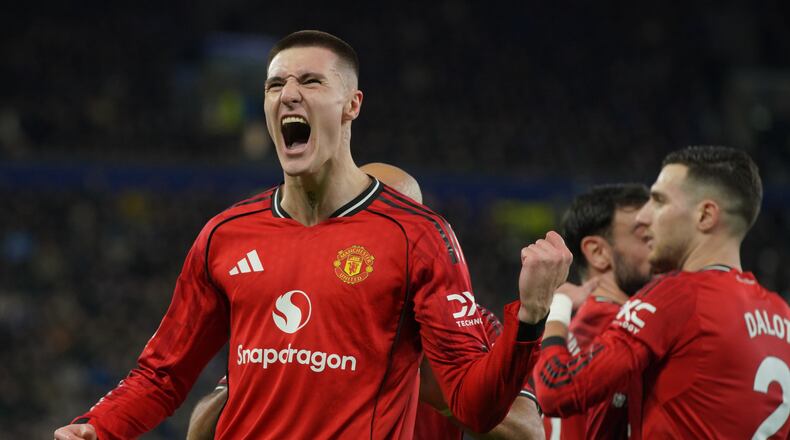 Manchester United's Benjamin Sesko celebrates after scoring during the Premier League soccer match between Manchester United and Everton in Liverpool, England, Monday, Feb. 23, 2026. (AP Photo/Ian Hodgson)
