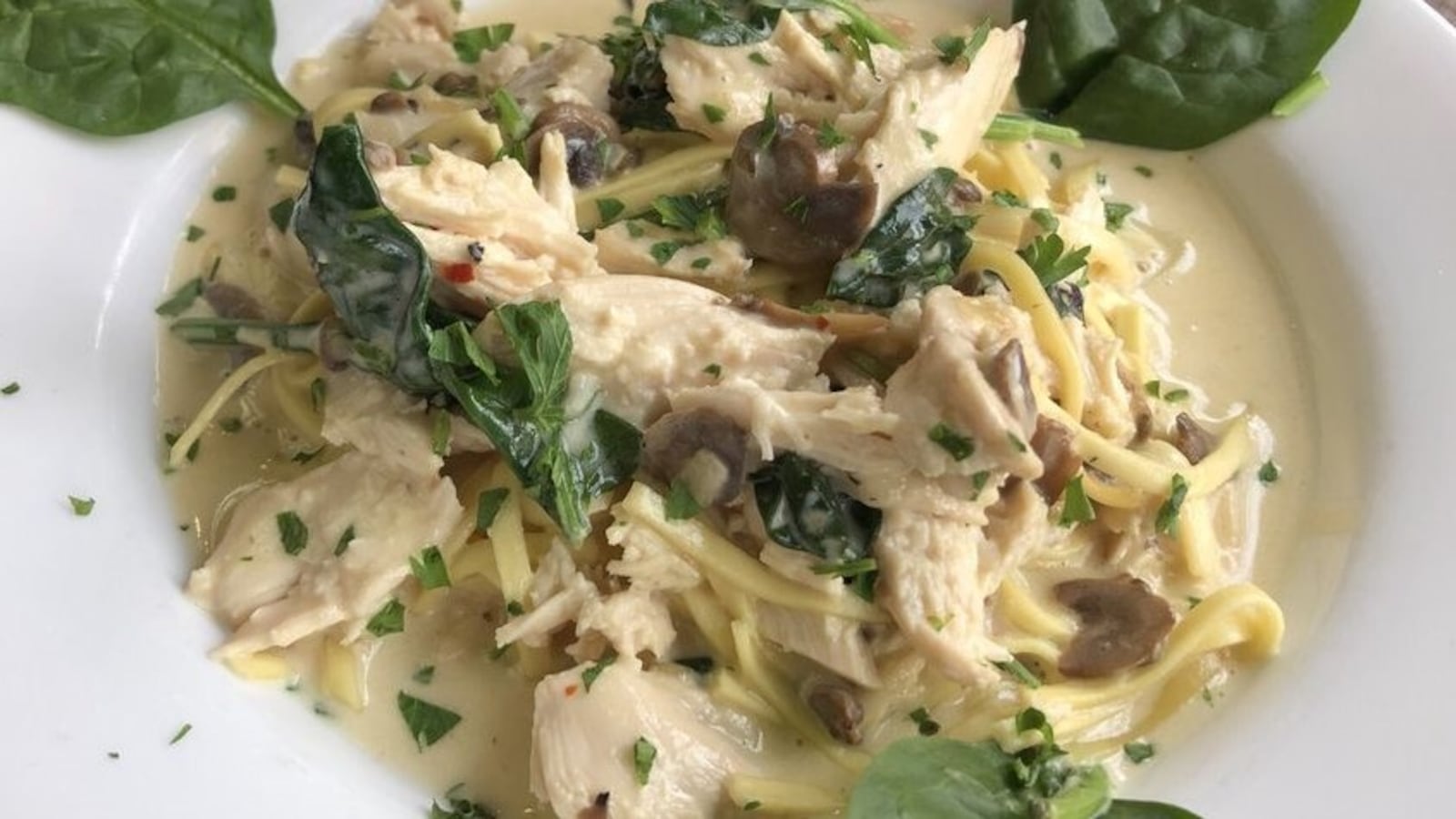 Lemon chicken with cream sauce, spinach and mushrooms. CONTRIBUTED