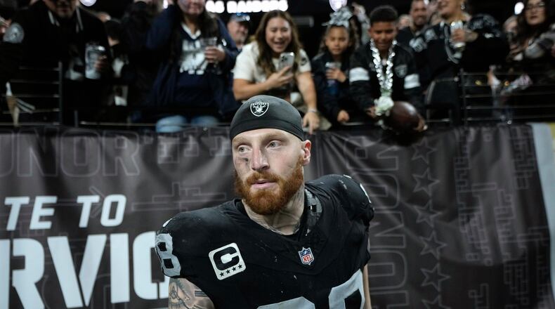 Las Vegas Raiders defensive end Maxx Crosby heads to the locker room after greeting the fans after an NFL football game against the Dallas Cowboys Monday, Nov. 17, 2025, in Las Vegas. (AP Photo/John Locher)