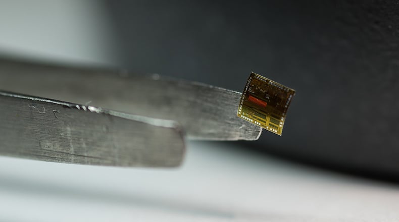 A collaboration between the Air Force Research Laboratory and American Semiconductor has produced a flexible silicon-on-polymer chip with more than 7,000 times the memory capability of any current flexible integrated circuit on the market today. The manufacturing takes advantage of flexible hybrid electronics, integrating traditional manufacturing techniques with 3D electronic printing to create thin, flexible semiconductors that can augment efforts in wearable technology, asset monitoring, logistics and more. (U.S. Air Force courtesy photo).