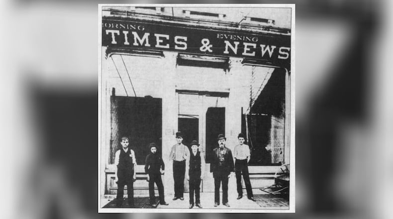Employees posed for photos in front of the Evening News and Morning Times Building on 27 E. Second St. when James M. Cox took control of the publication in 1898. He renamed the paper the Dayton Daily News. DAYTON DAILY NEWS ARCHIVES