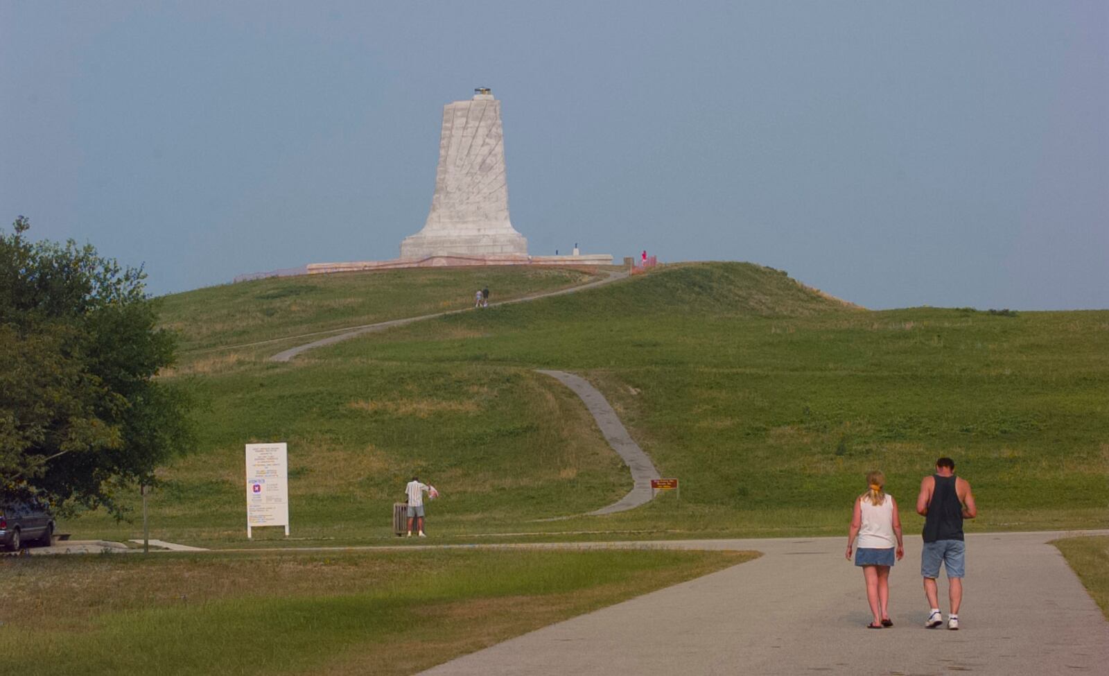Late evening visitors head for the Wright Brothers National memorial at Kill Devil Hills, North Carolina, 1997.