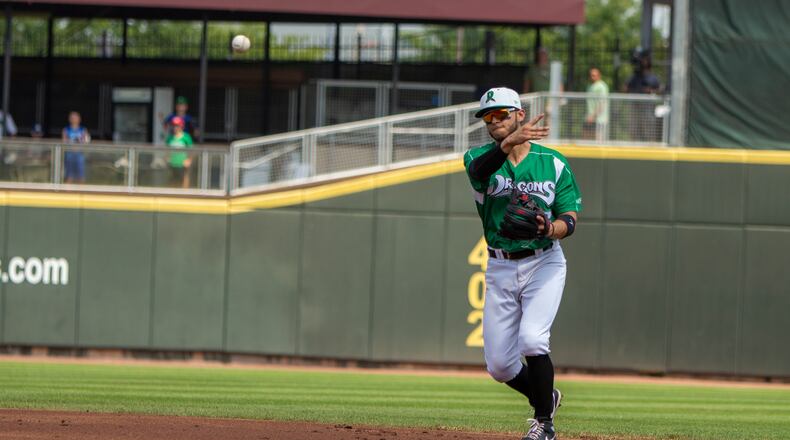 Dragons second baseman Victor Ruiz throws to first for an out during Sunday's game against Lake County at Day Air Ballpark. Jeff Gilbert/CONTRIBUTED