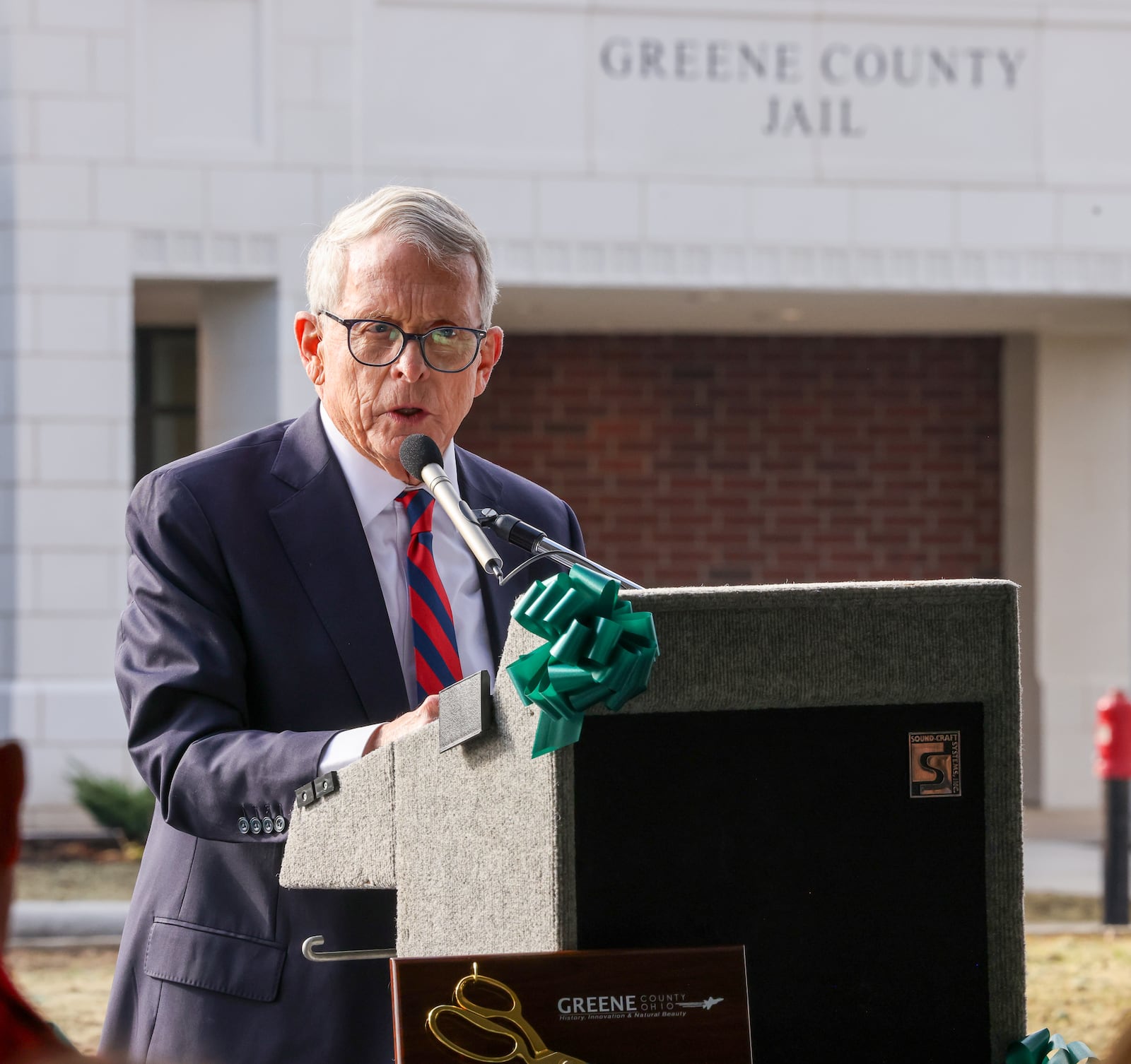 Gov. Mike DeWine speaks during a ribbon cutting ceremony for the newly-completed Greene County Jail on Wednesday, Nov. 19 in Xenia. About $15 million in state funds contributed to the project. BRYANT BILLING/STAFF