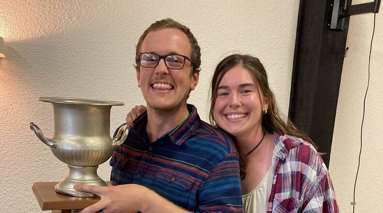 Josh Fries and his wife Sarah with the Botham Cup. CONTRIBUTED