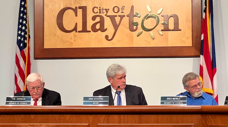 Clayton Mayor Mike Stevens, center, along with councilmen Tim Gorman, left, and Greg Merkle. FILE